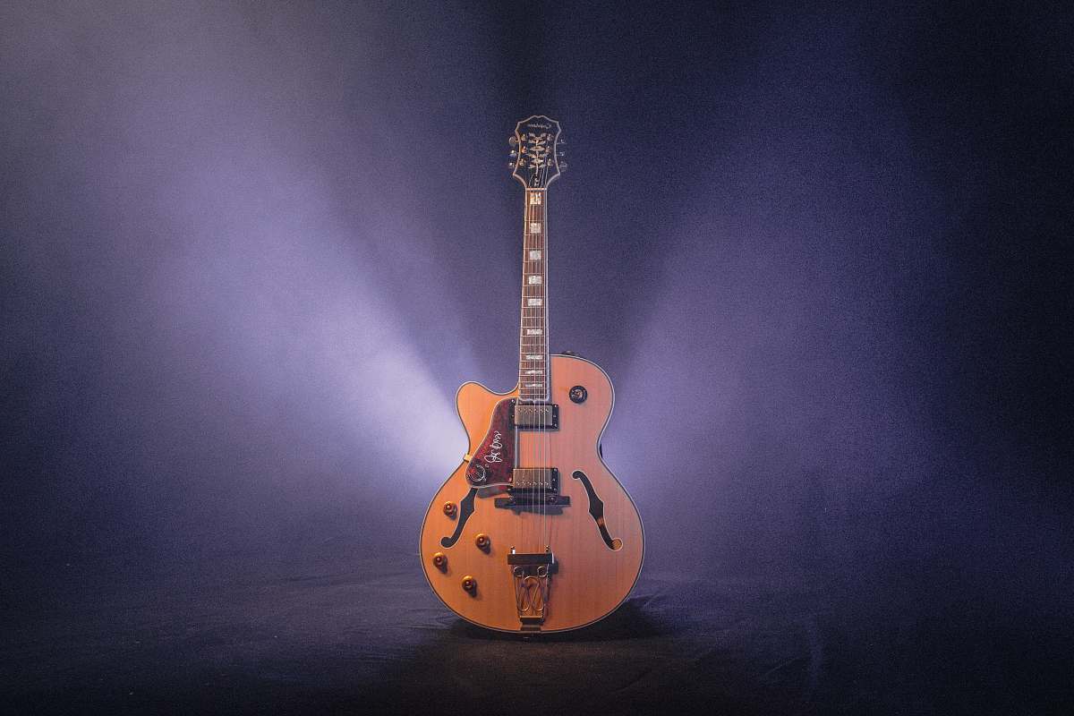 musical instrument brown and black jazz guitar with dim light leisure activities